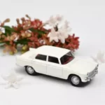 Peugeot 404 1961 – Courchevel white